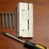 2 charnières universelles nylon blanc Diall 40 mm