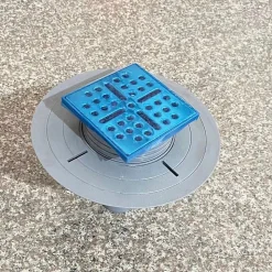 Bonde verticale DINO pour receveurs à carreler avec grille en acier inoxydable