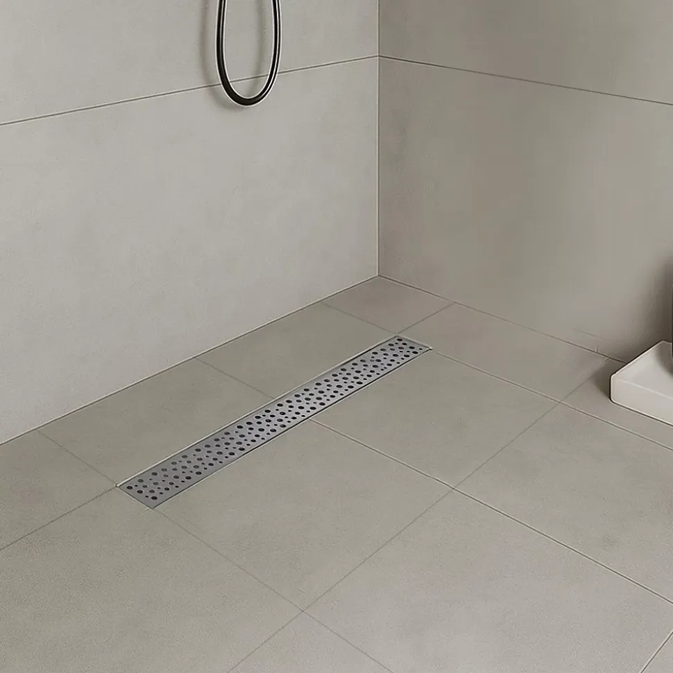 Caniveau de douche à l'Italienne GUMI motif bulle L.60 cm acier, anti-odeurs, débit élevé -SANIVERRE