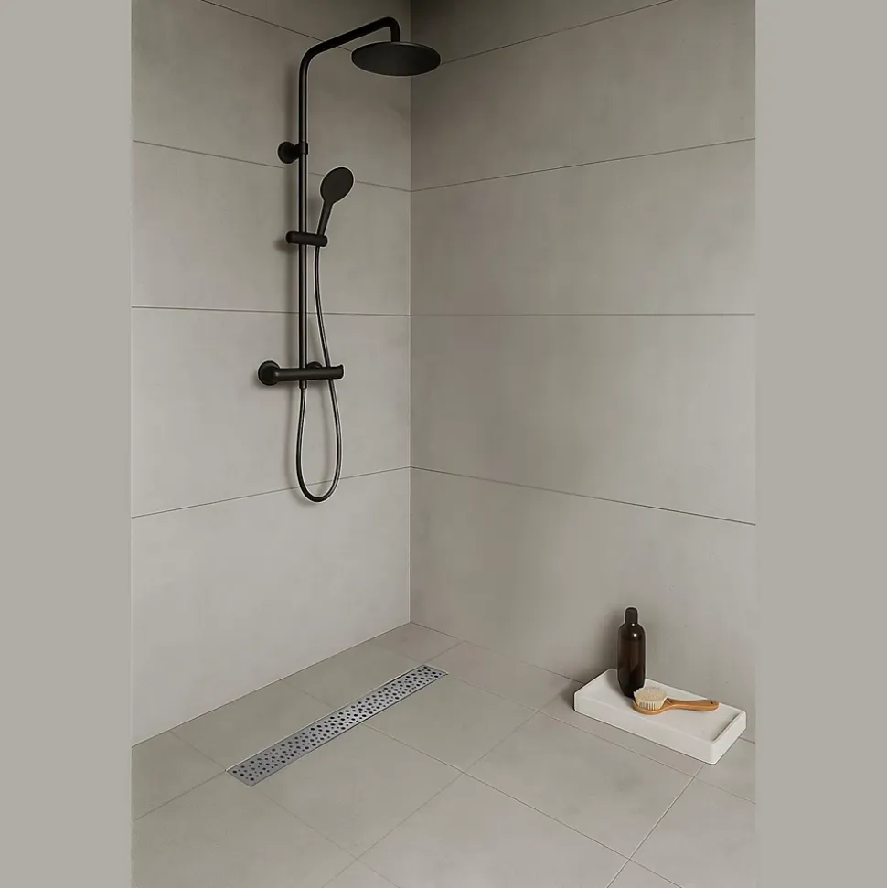 Caniveau de douche à l'Italienne GUMI motif bulle L.60 cm acier, anti-odeurs, débit élevé -SANIVERRE