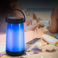 Lampe de table LED avec haut-parleur BT 'FESTA' pour l'extérieur en plastique noir avec LED intégrées, hauteur 18 cm