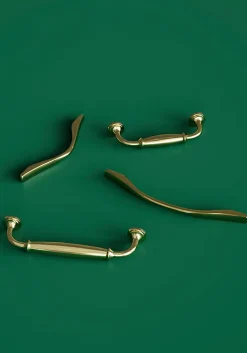 Poignée de meuble nœud GoodHome Ruis effet laiton doré l.169mm x l.10mm x H. 25mm entraxe 128mm