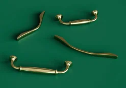 Poignée de meuble nœud GoodHome Ruis effet laiton doré l.169mm x l.10mm x H. 25mm entraxe 128mm